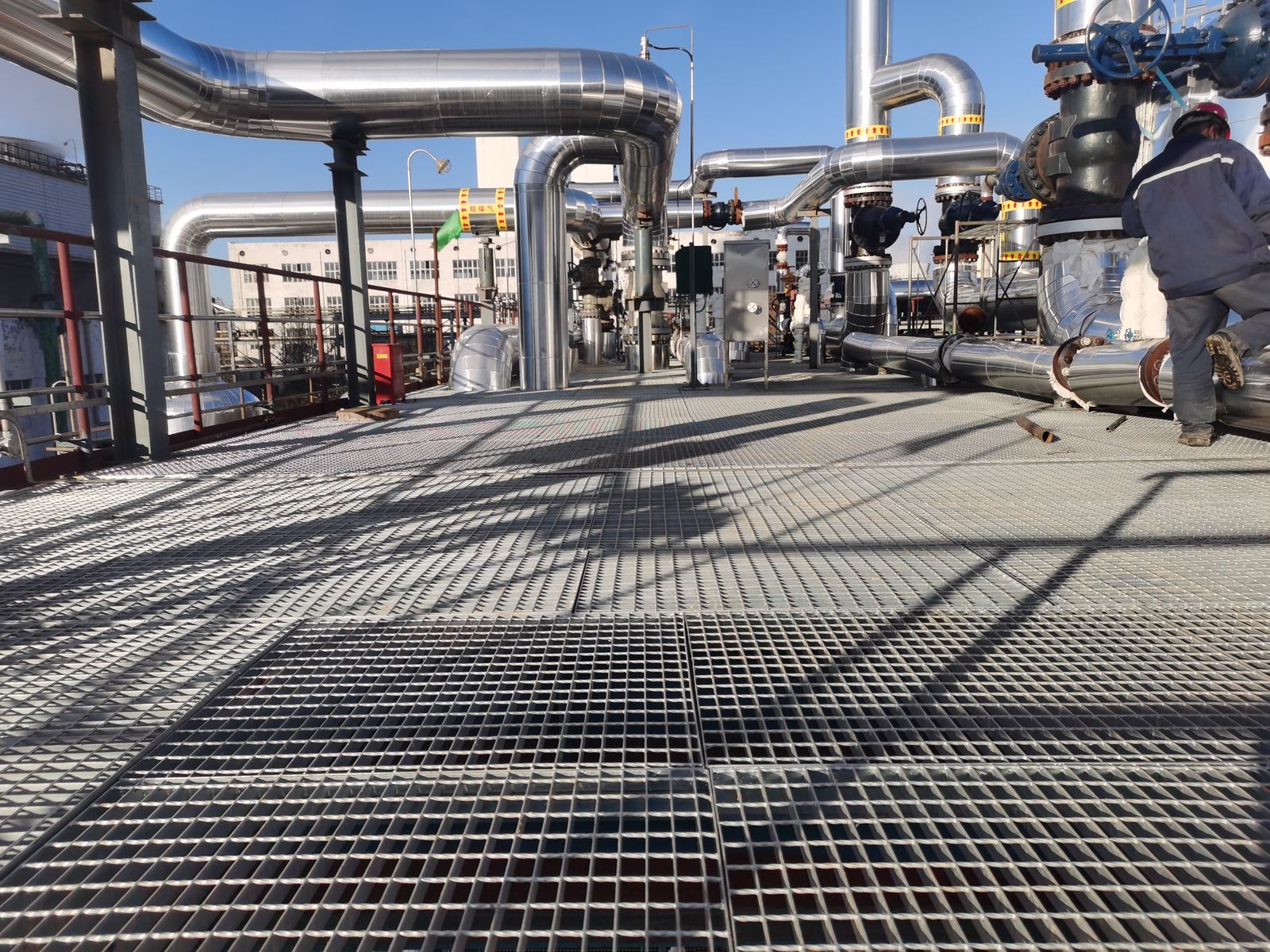 Steel grating platform decking illustrating span and load paths